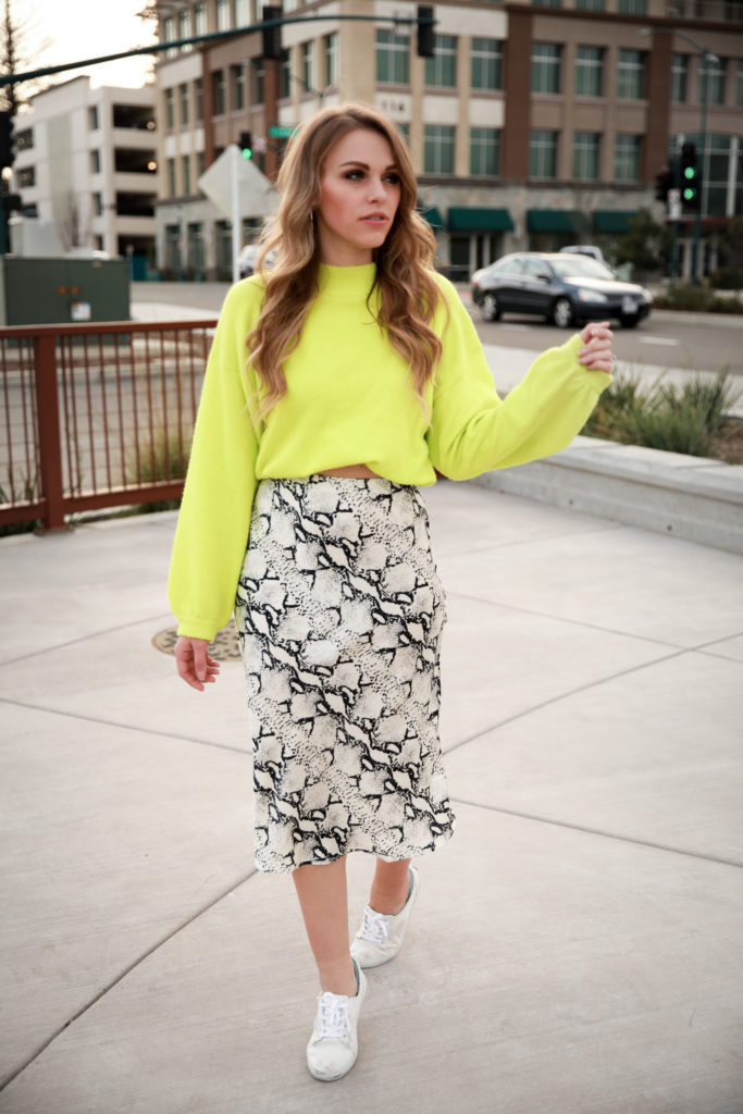 neon cropped sweater snake print midi skirt white sneakers womens outfit